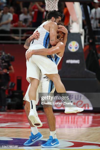 Facundo Campazzo and Nicolas Laprovittola of Argentina celebrate after their team's win against France during the semi-finals of 2019 FIBA World Cup...