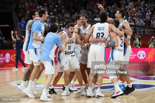 Team of Argentina celebrate after their team's win against France during the semi-finals of 2019 FIBA World Cup match between Argentina and France at...