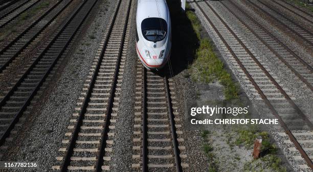 High speed train of the German railway Deutsche Bahn is seen near the main train station of Munich, southern Germany, on September 13, 2019. - The...