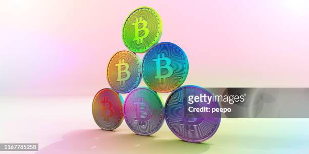 multi-coloured bitcoin coins in pyramid shape against multi-coloured pastel background - peer to peer finance stock pictures, royalty-free photos & images