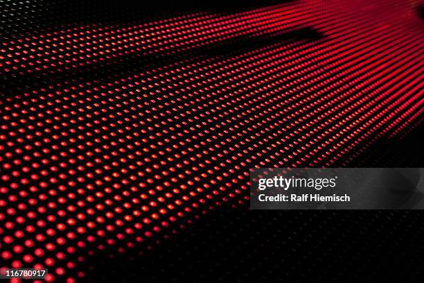 close-up, full frame of an abstract shape on an led display - luce led foto e immagini stock