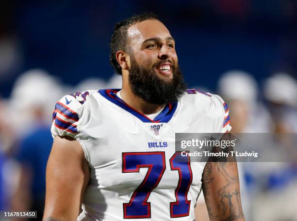 Nico Siragusa of the Buffalo Bills walks off the field after a a preseason game against the Indianapolis Colts at New Era Field on August 8, 2019 in...