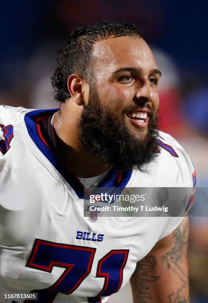 Nico Siragusa of the Buffalo Bills walks off the field after a a preseason game against the Indianapolis Colts at New Era Field on August 8, 2019 in...