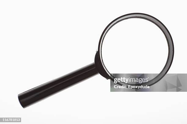 a magnifying glass - magnify imagens e fotografias de stock