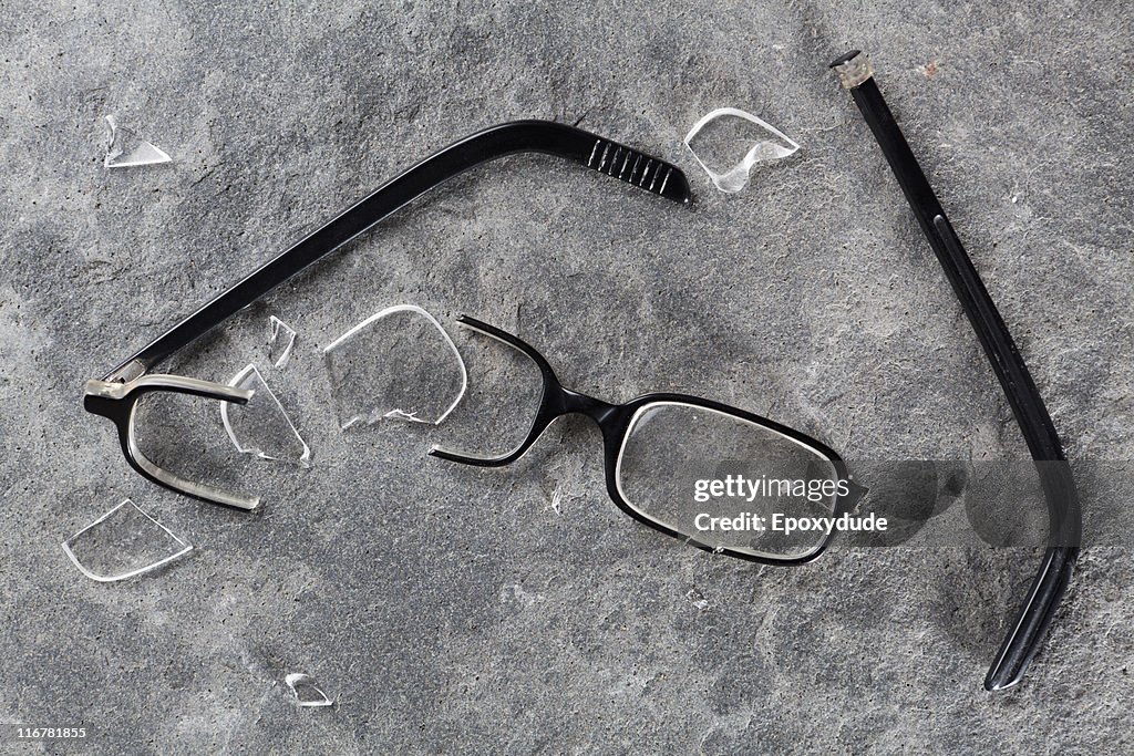 A broken pair of glasses