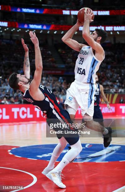 Patricio Garino of Argentina drives against Nando de Colo of France during the semi-finals of 2019 FIBA World Cup match between Argentina and France...