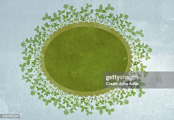 grass growing on an oval - grey clouds stock illustrations