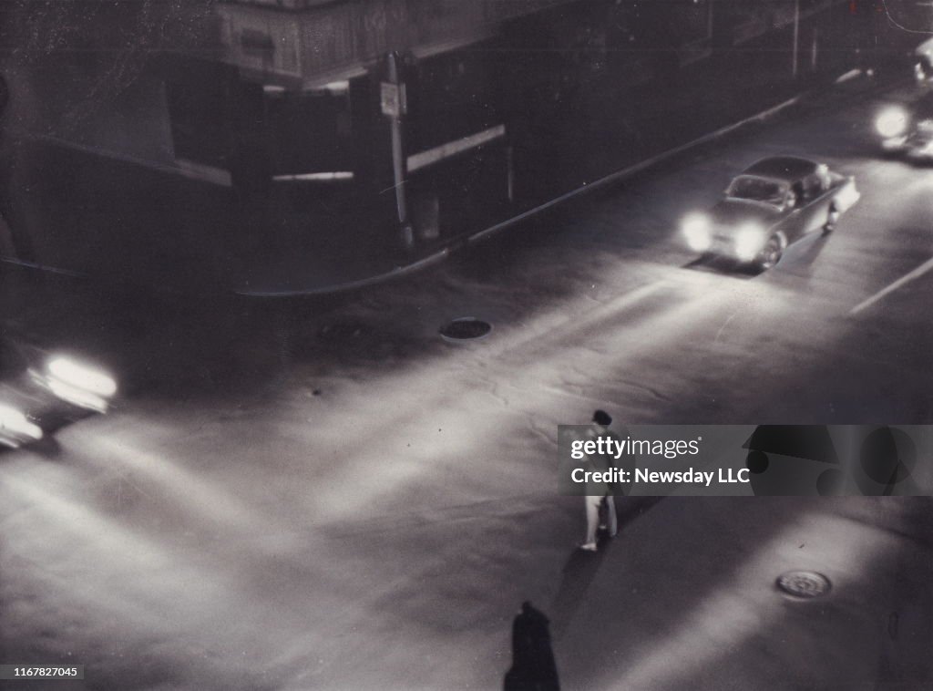 A Police Officer Directs Traffic During a Blackout in New York City in 1959