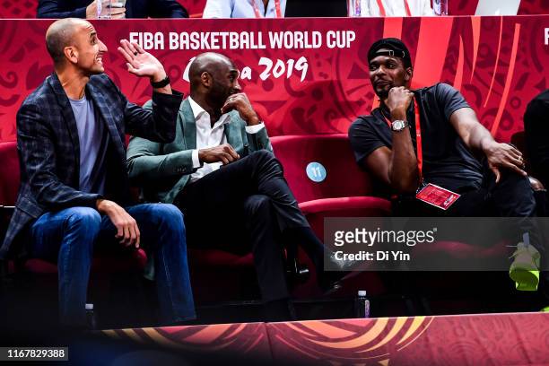 Manu Ginobili, Kobe Bryant and Chris Bosh talks to each other during the semi final march between Argentina and France of 2019 FIBA World Cup at the...