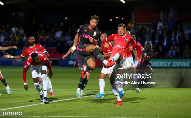Gaetano Berardi of Leeds United scores the second goal during the Carabao Cup First Round match between Salford City and Leeds United at Moor Lane on...
