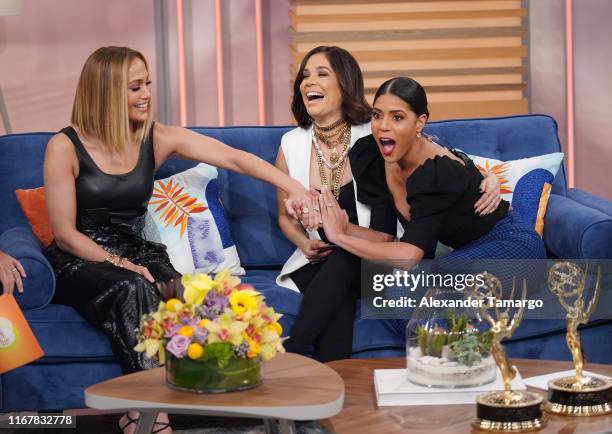 Jennifer Lopez, Karla Martinez and Francisca Lachapel are seen on the set of "Despierta America" at Univision Studios to promote the film "Hustlers"...