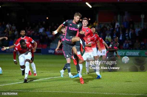 Gaetano Berardi of Leeds United scores the second goal during the Carabao Cup First Round match between Salford City and Leeds United at Moor Lane on...