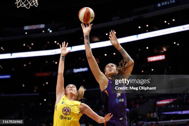 Center Brittney Griner of the Phoenix Mercury takes a shot defended by center Maria Vadeeva of the Los Angeles Sparks at Staples Center on August 08,...