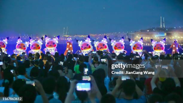 pokémon go fest 2019 yokohama - pikachu breakout at red brick warehouse - pokemon go stock pictures, royalty-free photos & images