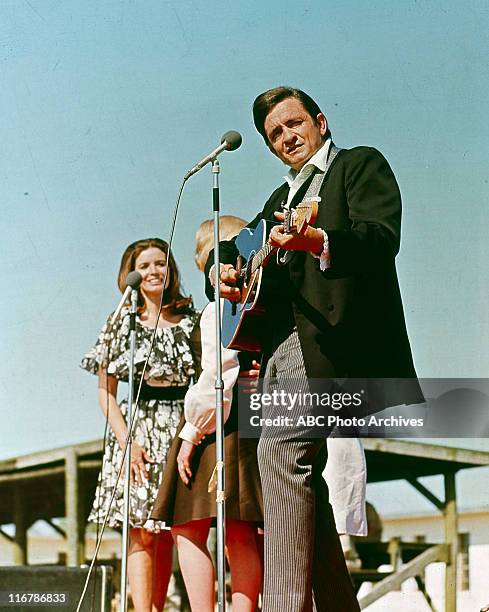 On Location at Cummins Prison Farm, Arkansas - Shoot Date: April 10, 1969. JUNE CARTER CASH;JOHNNY CASH