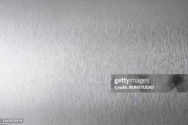 brushed metal surface - platino fotografías e imágenes de stock