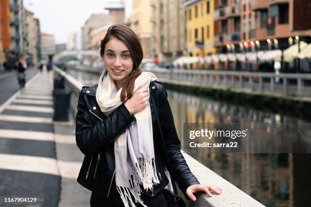 beautiful girl smiling - girl scarf stock pictures, royalty-free photos & images