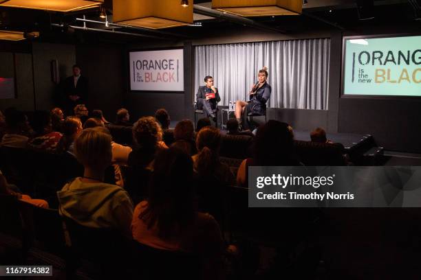 Dino Ramos and Laverne Cox speak during SAG-AFTRA Foundation Conversations with "Orange Is The New Black" at SAG-AFTRA Foundation Screening Room on...