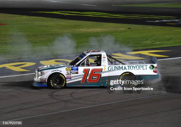 Austin Hill Hattori Racing Enterprises Toyota Tundra does a burnout to celebrate the race win during the NASCAR Gander Outdoors Truck Series World of...