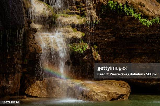 rainbow on waterfall - pierre yves babelon madagascar stock-fotos und bilder