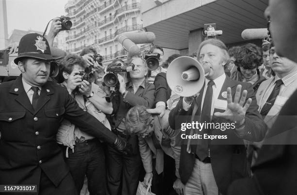 British trade unionist Arthur Scargill talks to demonstrators asking for a 24-hours strike to support miners outside a TUC conference, UK, 3rd...