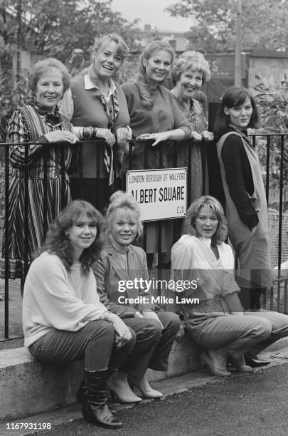 Cast members from television soap opera EastEnders pictured together on the Albert Square set at Elstree Studios in Elstree,UK, 10th October 1984;...