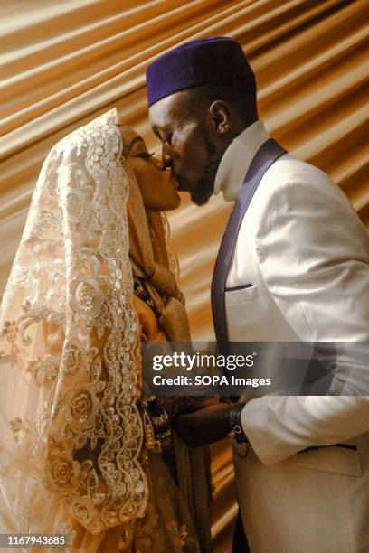 Abdul Nassir and his beautiful soul mate Dalifa Suleiman express their love to each other after the traditional Islamic wedding in Kibera. The Nubian...