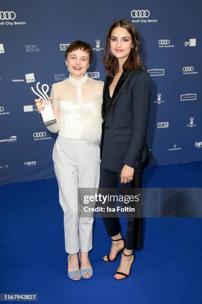 German actress and award winner Lena Urzendowsky and German actress Luise Befort at the award ceremony of the "Deutscher Schauspielpreis" at Zoo...