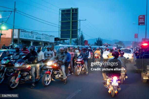 September 2019, Congo, Goma: Motorcycles drive through the metropolis of Goma. Photo: Kay Nietfeld/dpa