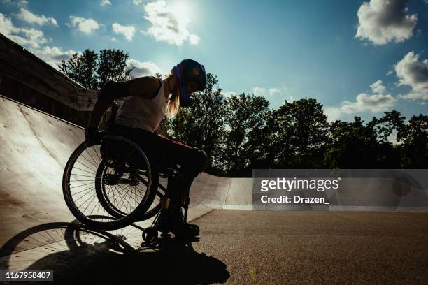 disabled woman doing sports - disabled extreme sports stock pictures, royalty-free photos & images
