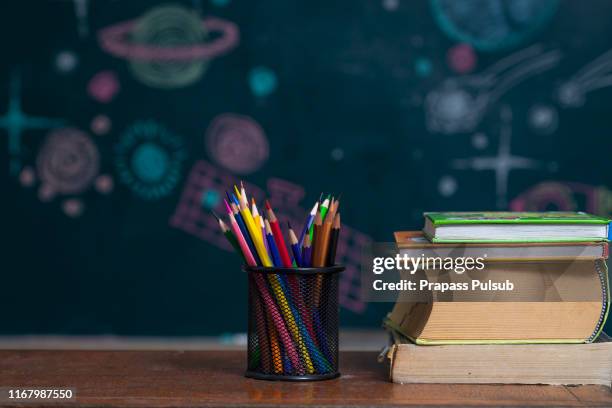 school books on desk, education concept - history textbook stock pictures, royalty-free photos & images