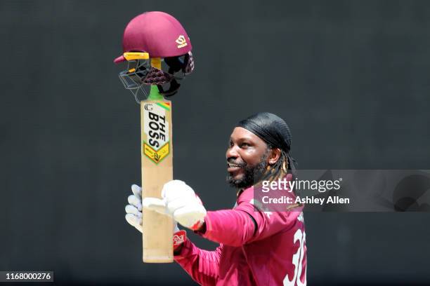Chris Gayle of the West Indies salutes the crowd as he walks off the field out for 72 during the third MyTeam11 ODI between the West Indies and India...