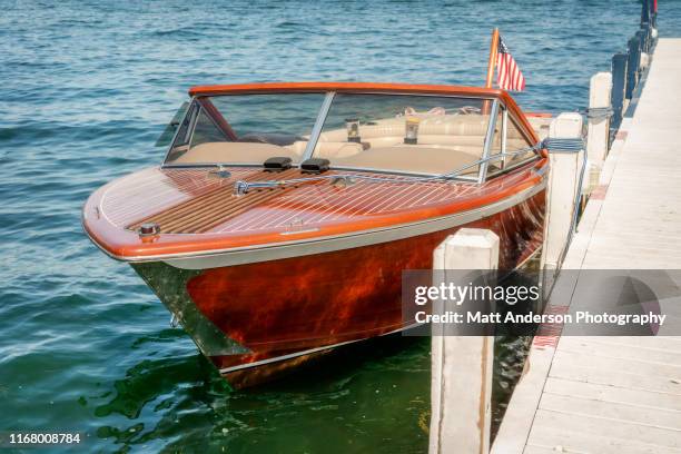 wood boat at dock - lake fishing boat stock pictures, royalty-free photos & images