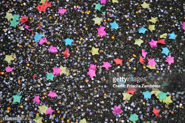 confetti on the floor - brazilian carnival stock pictures, royalty-free photos & images