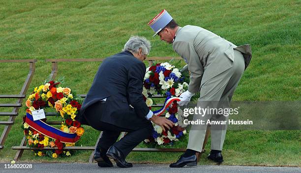 French Prime Minister Dominique de Villepin lays a wreath during a ceremony to mark the 90th anniversary of the Battle of Vimy Ridge, in which more...
