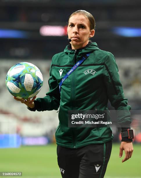 Match referee Stephanie Frappart inspects the pitch ahead of the UEFA Super Cup match between Liverpool and Chelsea at Vodafone Park on August 14,...