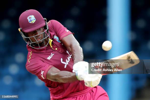 Jason Holder of the West Indies keeps his eye on the ball during the third MyTeam11 ODI between the West Indies and India at the Queen's Park Oval on...