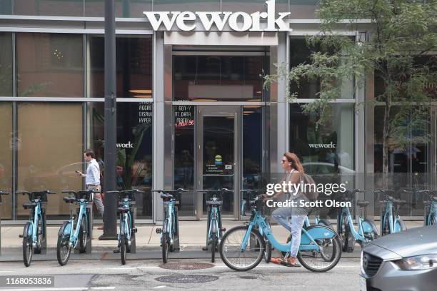 Sign marks the location of a WeWork office facility on August 14, 2019 in Chicago, Illinois. WeWork, a real estate firm that leases shared office...