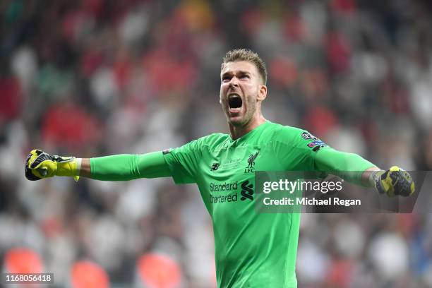 Adrian of Liverpool celebrates Sadio Mane of Liverpool scoring his team's second goal during the UEFA Super Cup match between Liverpool and Chelsea...