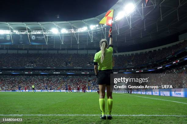 Assistant referee Manuela Nicolosi lifts the flag during the UEFA Super Cup match between Liverpool and Chelsea at Vodafone Park on August 14, 2019...