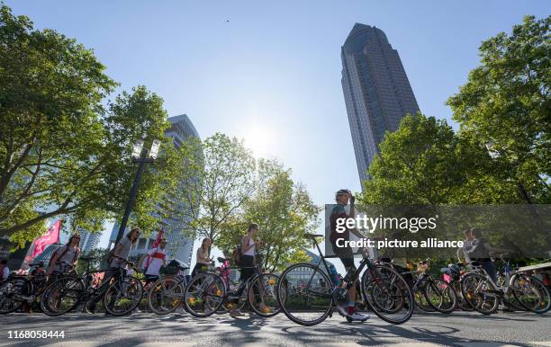 September 2019, Hessen, Frankfurt/Main: On the first public day of the International Motor Show , cyclists demonstrate against the automotive...