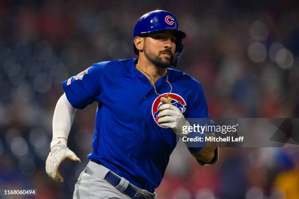 Nicholas Castellanos of the Chicago Cubs runs to first base against the Philadelphia Phillies at Citizens Bank Park on August 13, 2019 in...