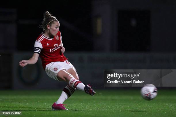 Kim Little of Arsenal scores her sides second goal from the penalty spot during the Pre Season Friendly match between Arsenal and Barcelona at Meadow...