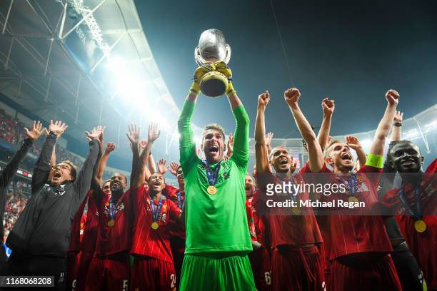 Adrian of Liverpool lifts the UEFA Super Cup trophy as Liverpool celebrates victory following the UEFA Super Cup match between Liverpool and Chelsea...