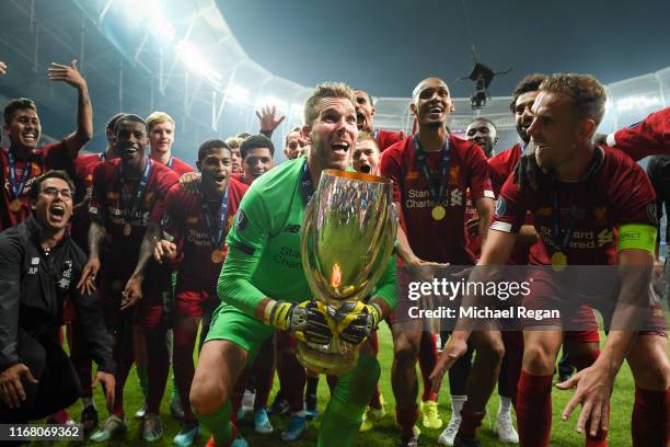 Adrian of Liverpool lifts the UEFA Super Cup trophy as Liverpool celebrates victory following the UEFA Super Cup match between Liverpool and Chelsea...