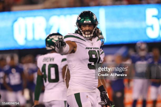 Defensive Lineman Bronson Kaufusi of the New York Jets in action against the New York Giants during their Preseason game at MetLife Stadium on August...