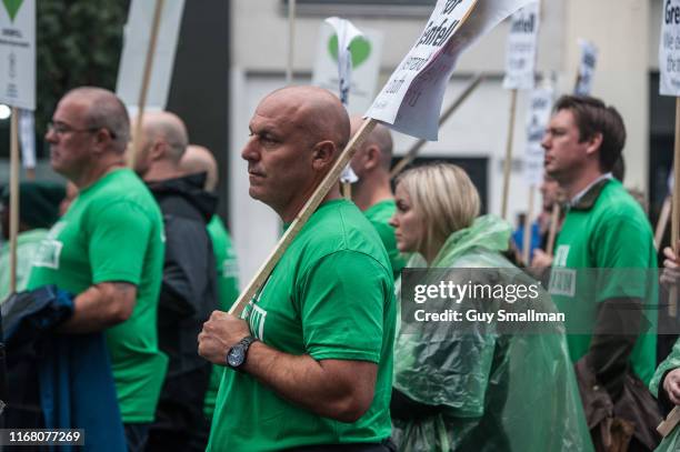 Survivors of the Grenfell Tower disaster are joined by Fire Fighters and supporters on the monthly silent march at Grenfell Tower on August 14, 2019...