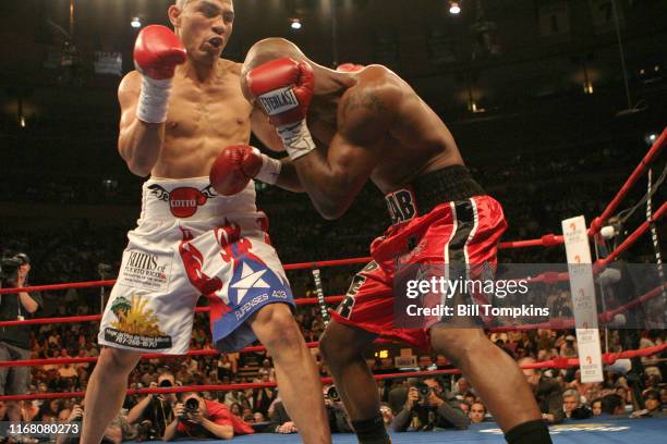 June 9: MANDATORY CREDIT Bill Tompkins/Getty Images Miguel Cotto defeats Zab Judah by TKO in the 11th round in their Welterweight fight at Madison...