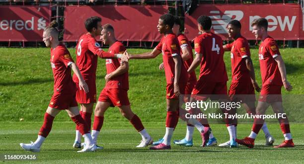 Elijah Dixon-Bonner of Liverpool celebrates his goal with team mate Pedro Chirivella during the PL2 game at The Kirkby Academy on September 14, 2019...
