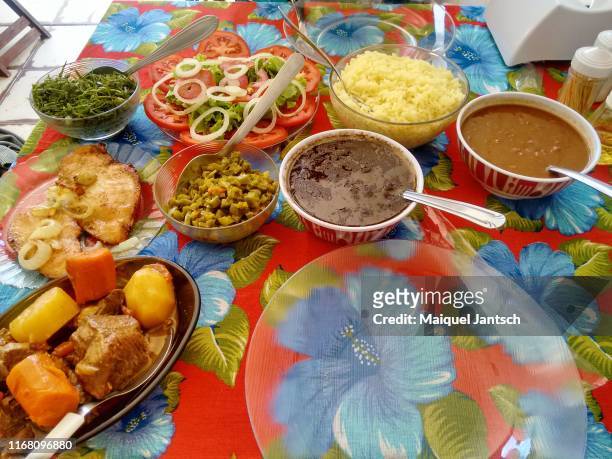 typical brazilian meal. - brazilian feijoada dish stock pictures, royalty-free photos & images